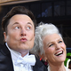 Elon Musk makes a kissy face next to his mother, Maye Musk, at the 2022 Met Gala